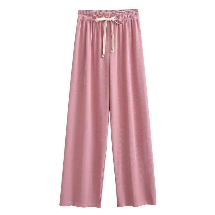 Wide palazzo pants for ladies with elastic waistband and decorative cord Lune London