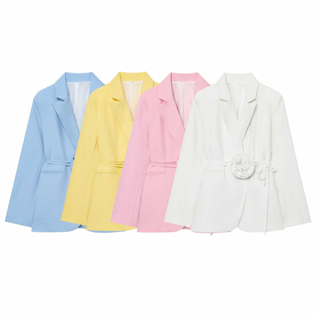 Ladies elegant blazer with attached decorative belt and floral accents Lune London