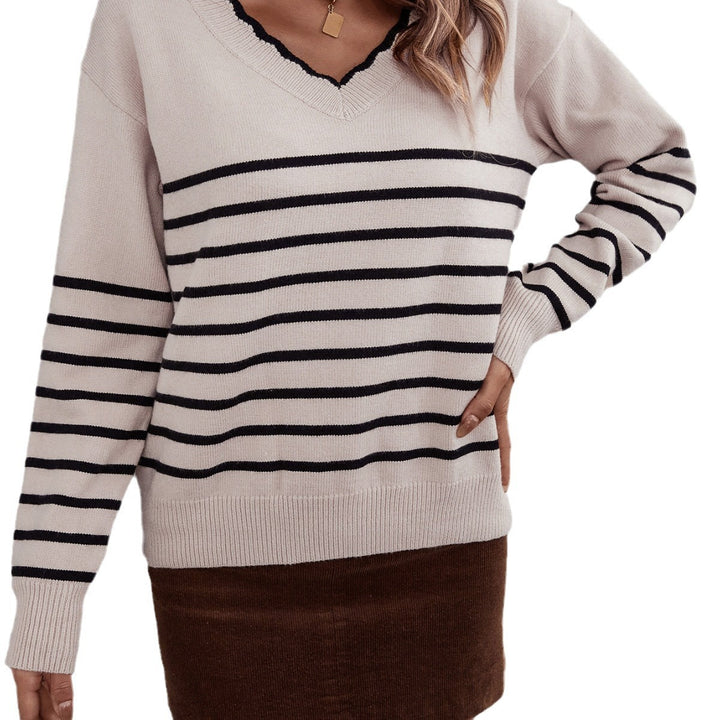Pullover féminin à la mode à encolure en V avec motif rayé Chic & Stil