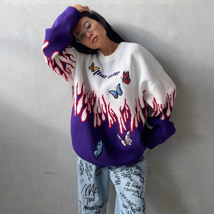 Chunky knit sweater for women with a unique design of flames and butterflies Lune London