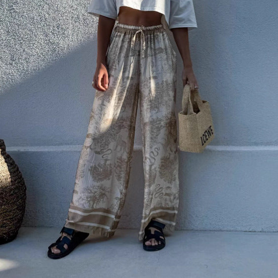 Wide palazzo pants for Damen with floral pattern and elastic waistband Lune London