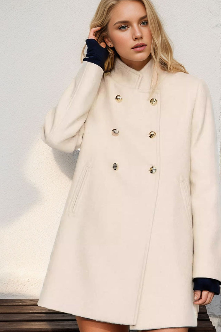 Elegant wool coat for women with double-breasted buttons and practical high collar Lune London