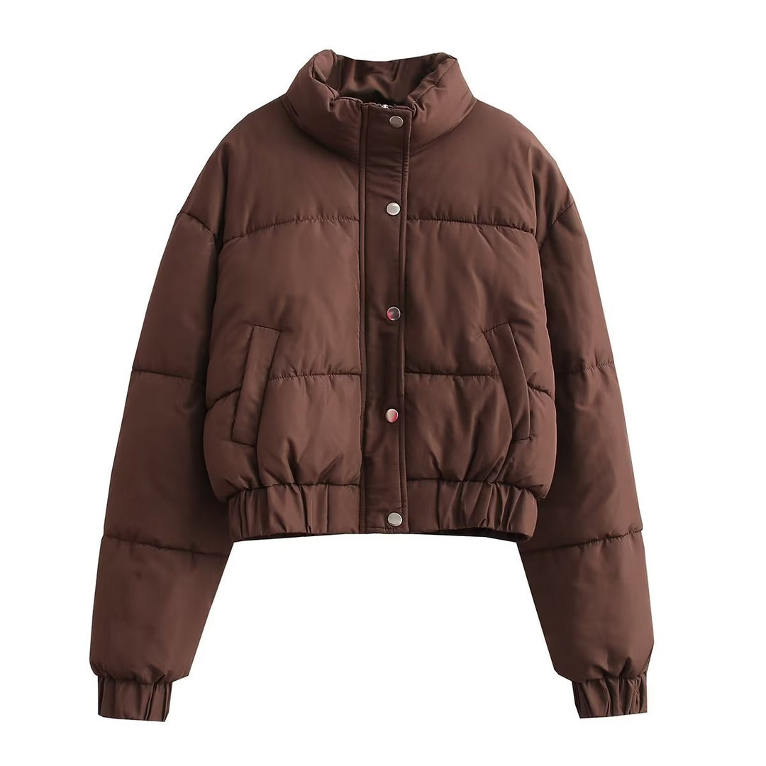 Quilted jacket for women with high collar and practical pockets Lune London