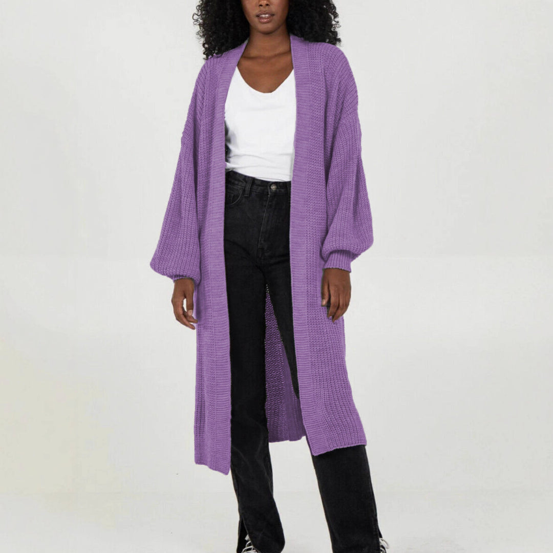 Plus size knitted cardigan for women with voluminous sleeves and an opening at the front Lune Londonl