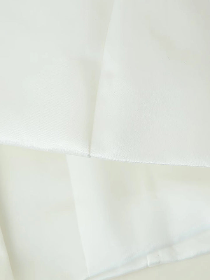 Fitted blouse for women with modern button details and a high collar Lune London