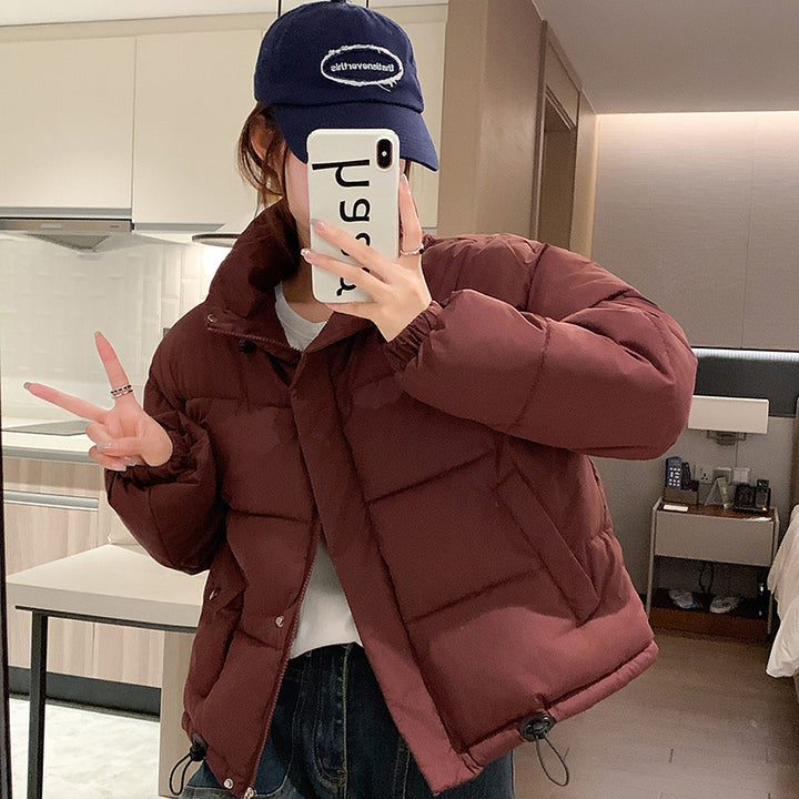 Trendy short women's jacket with insulating filling and practical pockets