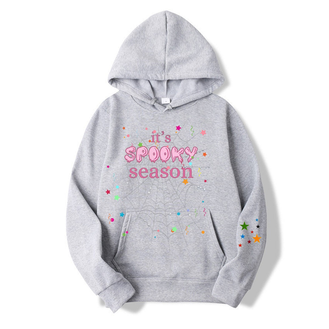Women cozy hoodie with graphic Halloween design Chic & Stil