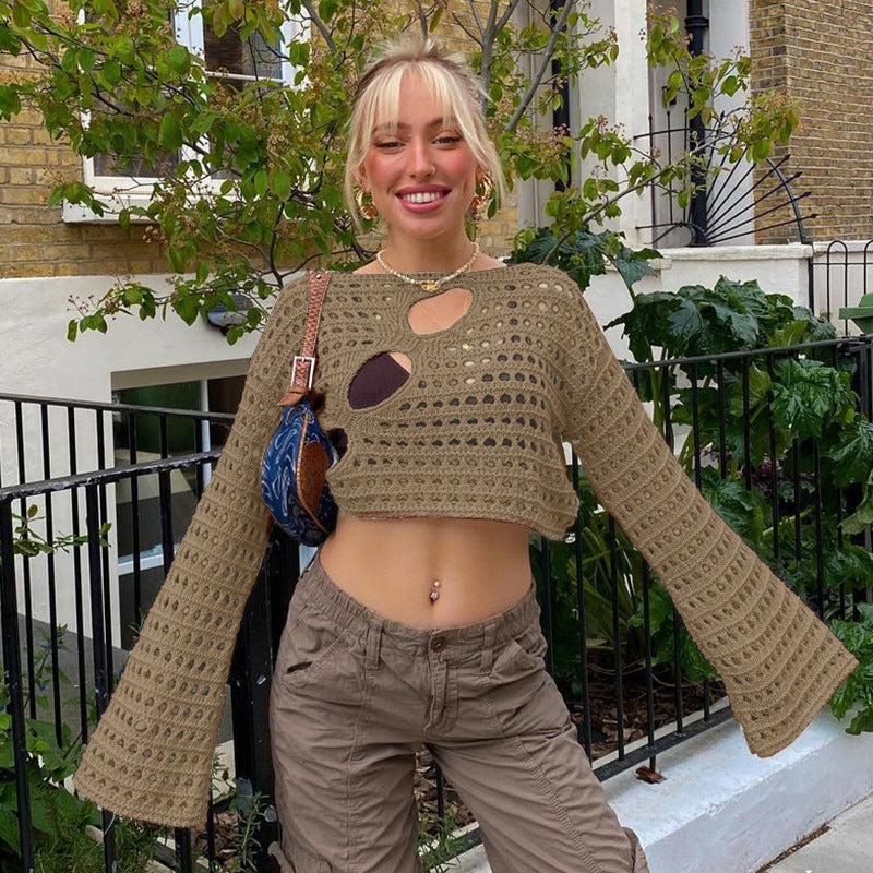 Ladies casual cropped knit sweater with a unique hole pattern Lune London