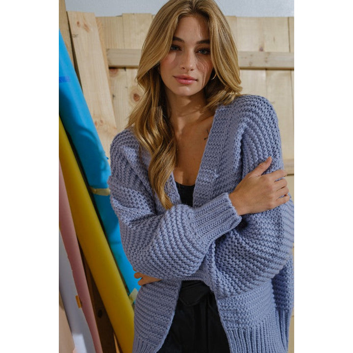 Ladies comfortable knitted vest with an open front design and a trendy structured pattern Lune London