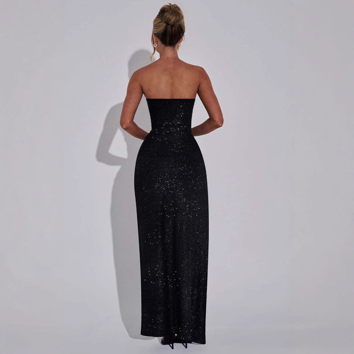 Glamorous strapless maxi dress for women with sparkling fabric and elegant leg slit Chic & Stil