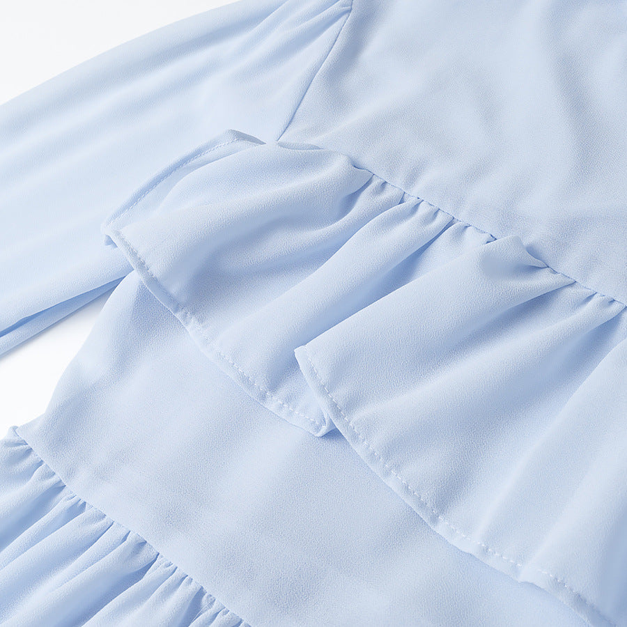 Women elegant blouse with voluminous ruffles and asymmetrical cut Lune London