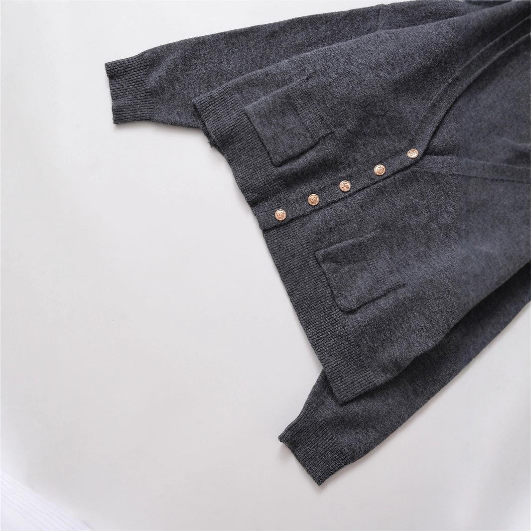 Ladies Short Knit Vest with V-Neck and Button Details Lune London