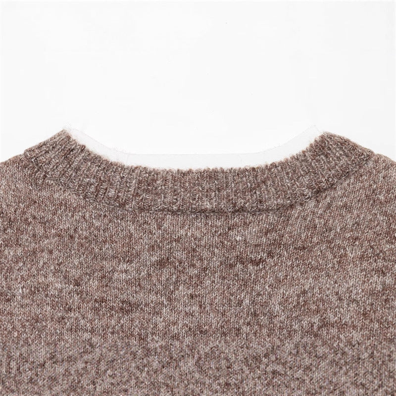 Fashionable knitted jacket for women with a fine knit design and elegant button details Lune London