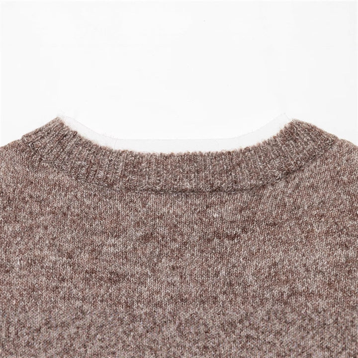 Fashionable knitted jacket for women with a fine knit design and elegant button details Lune London