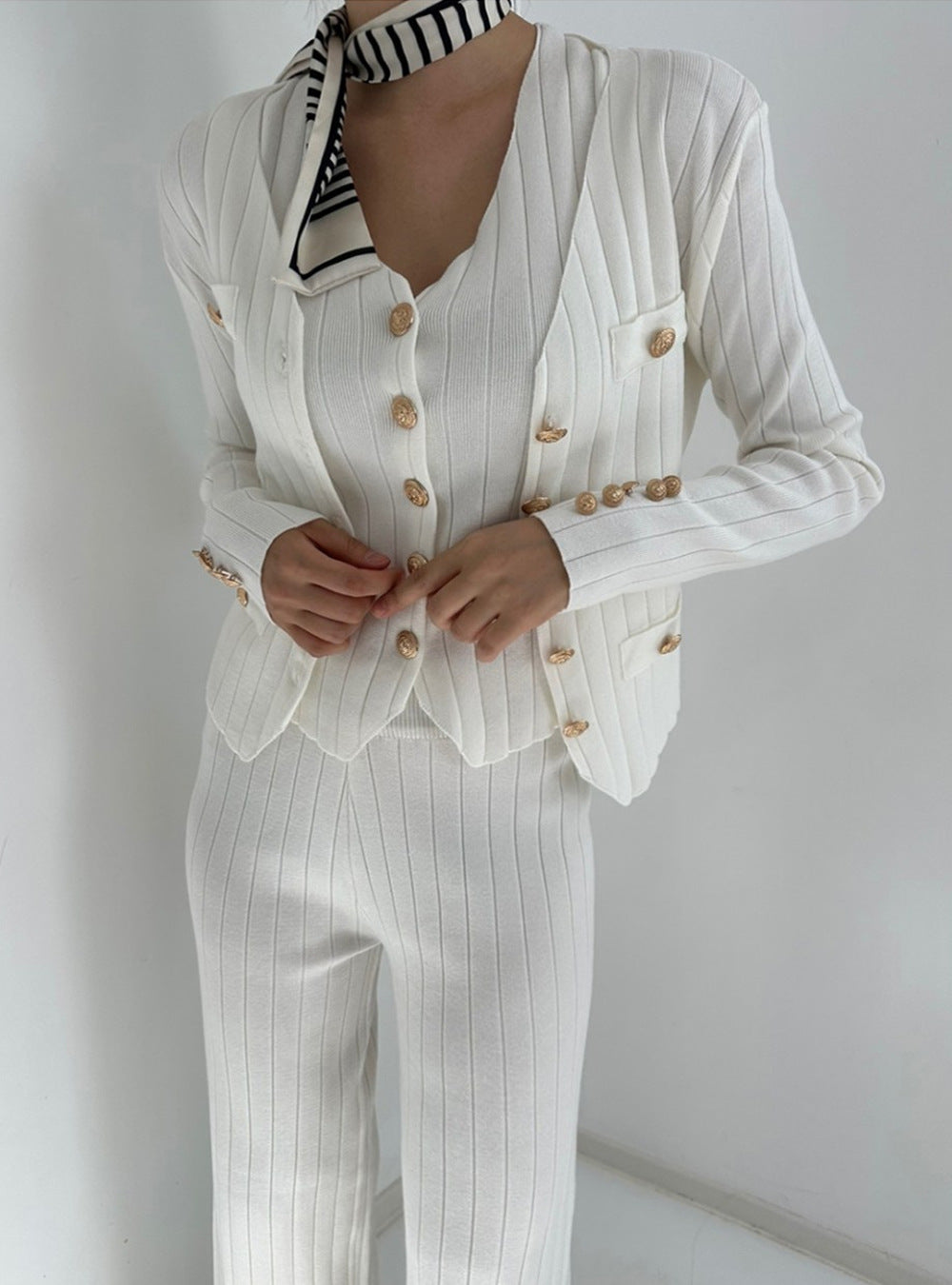 Elegant knitted set for ladies with chic and stylish button details