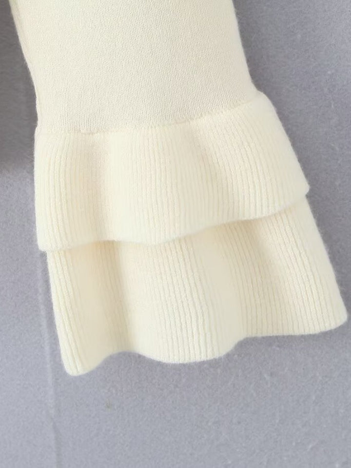 Short sleeve knitted jacket for women with ruffle details and button closure Lune London