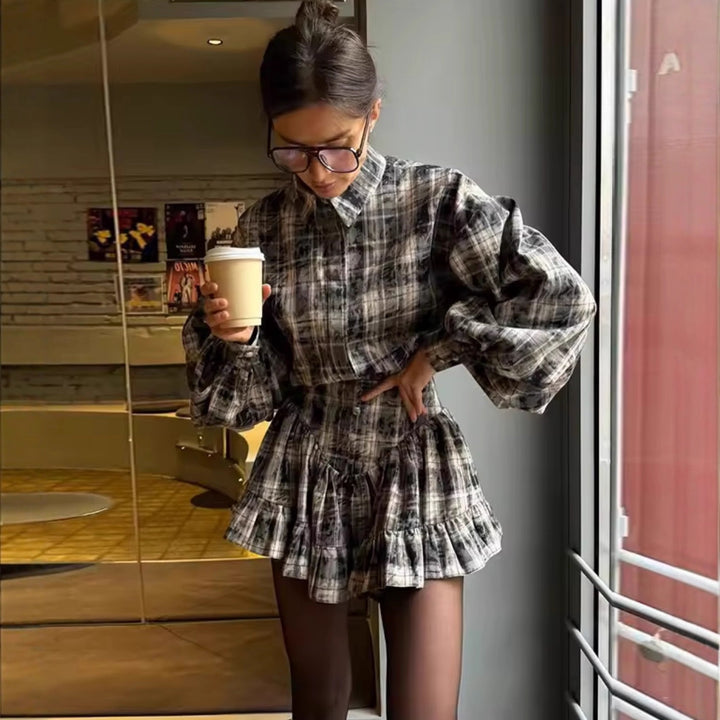 Ladies checkered pattern outfit with striped blouse and ruffled ensemble Lune London