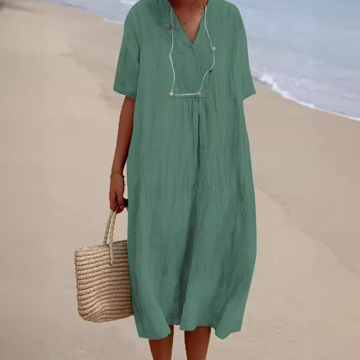 Casual beach dress for women with V-neck and wide hem Lune London