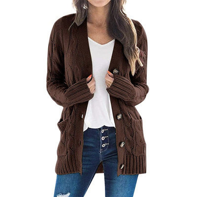 Knitted cardigan for women with cable pattern and practical pockets Lune London