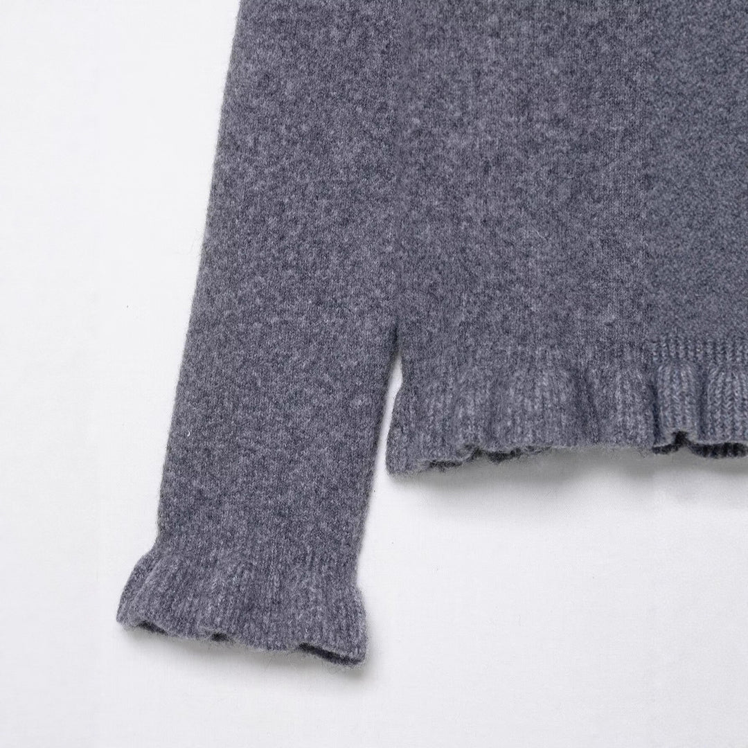 Cardigan féminin espiègle avec volants Chic & Stil