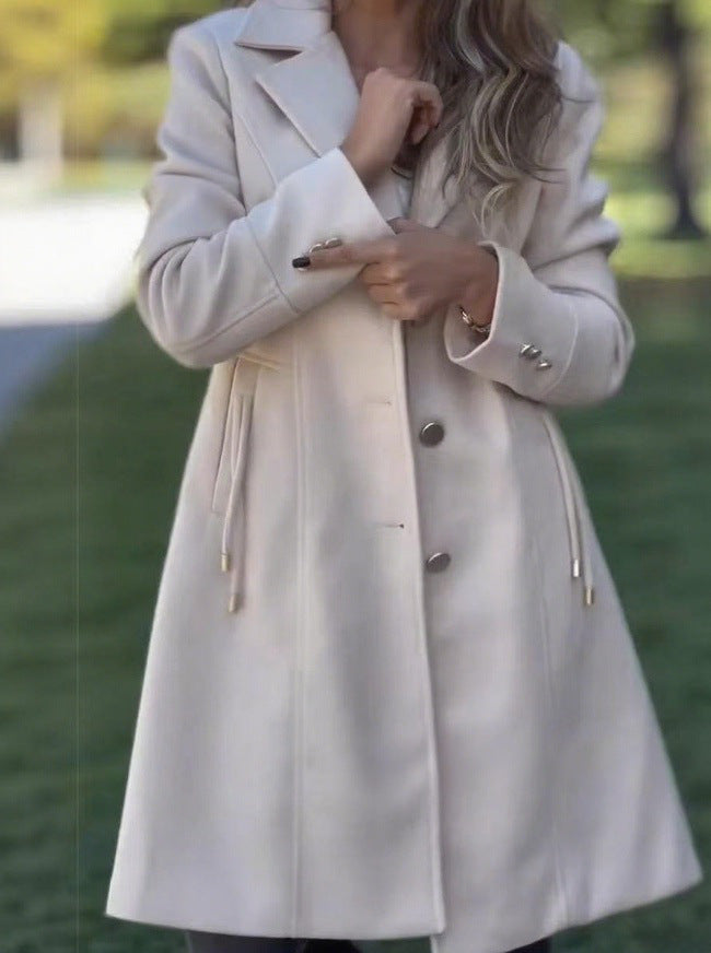 Elegant coat for ladies with adjustable belt and high-quality button details Lune London