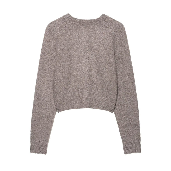 Short knitted jacket for women with an elegant round neck and button closure Lune London