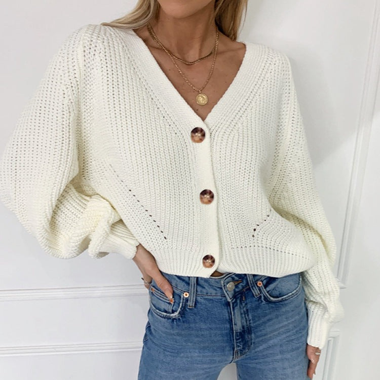 Thick knitted jacket for ladies with elegant button details and drop shoulders Lune London