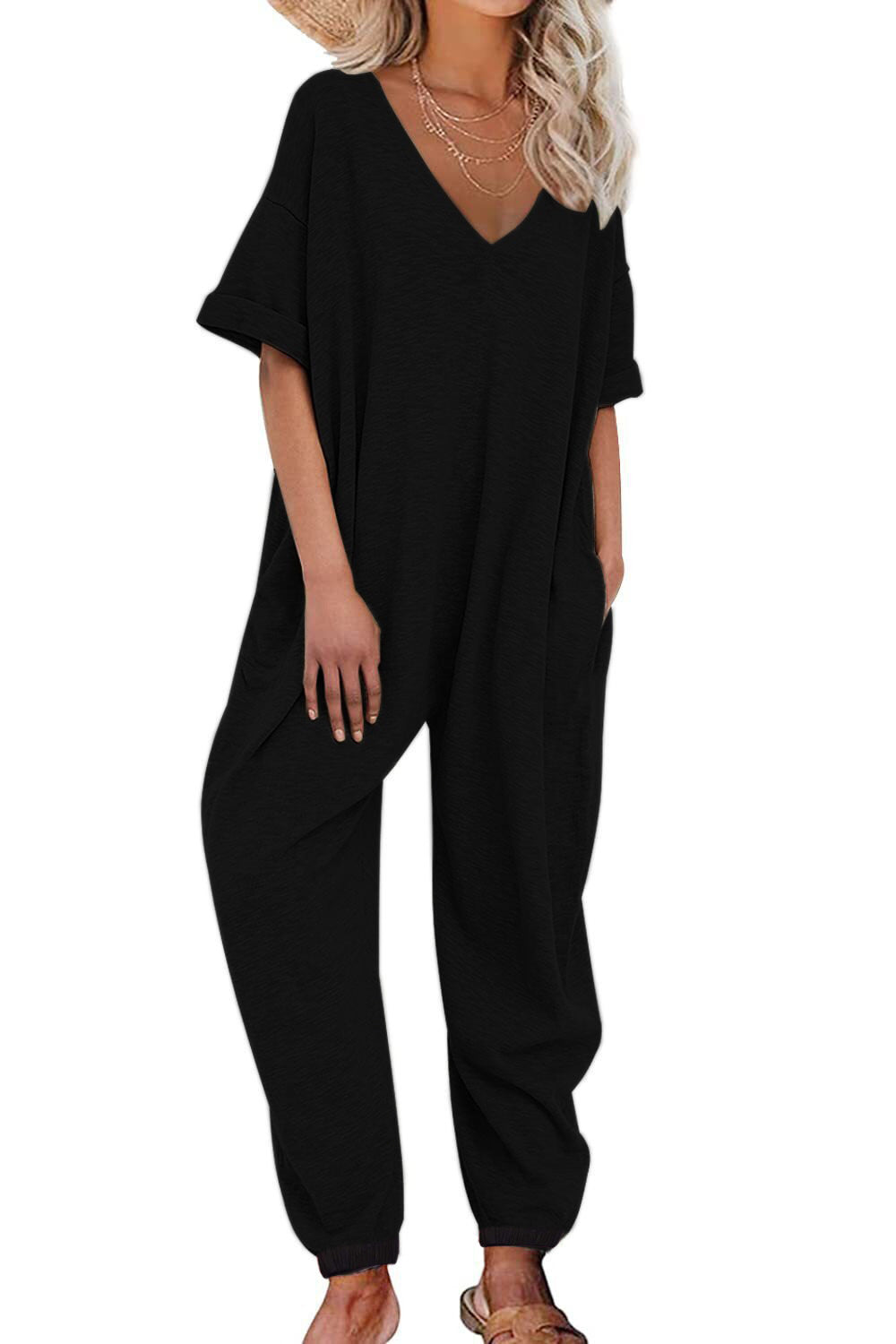 Oversized jumpsuit for women with deep V-neckline and casual pockets Lune London