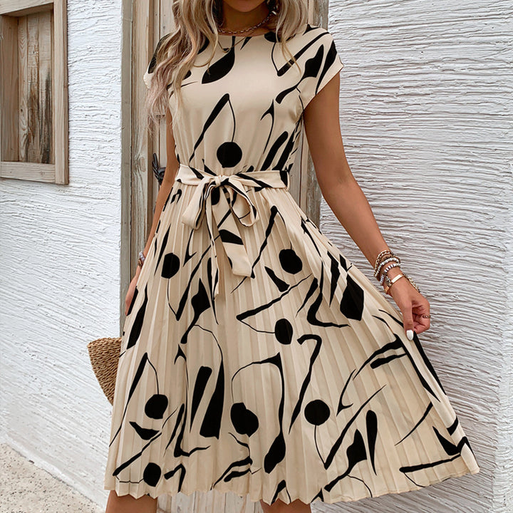 Lune London A-line pleated dress for ladies with abstract print and fitted belt