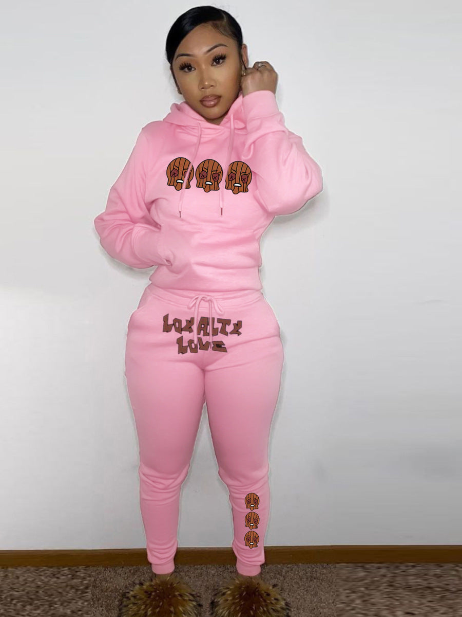 Sweatshirt and jogging pants set for women with creative Christmas pattern and comfortable fit Lune London