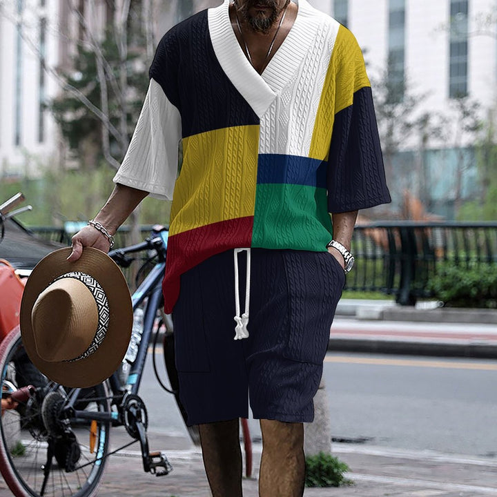Trendy short sleeve jumpsuit set for men with eye-catching color blocks and a relaxed fit Lune London