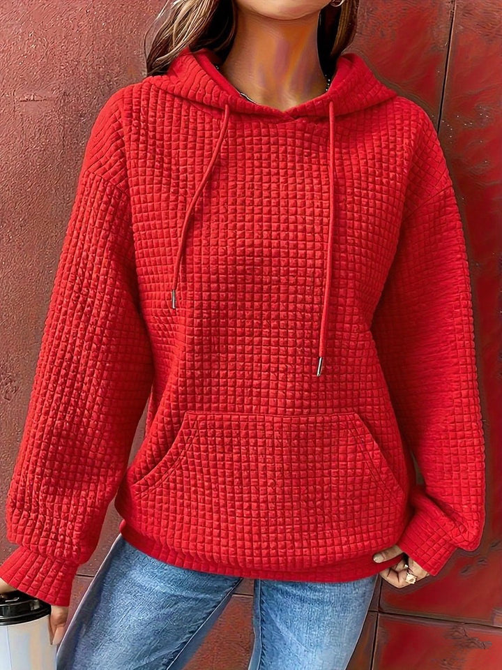 Sweat à capuche femme en motif waffle texturé avec poches latérales Chic & Stil