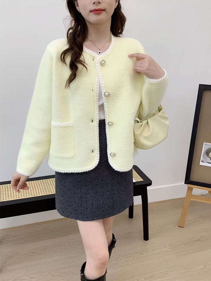 Cardigan féminin élégant avec patte de boutonnage décorative et poches