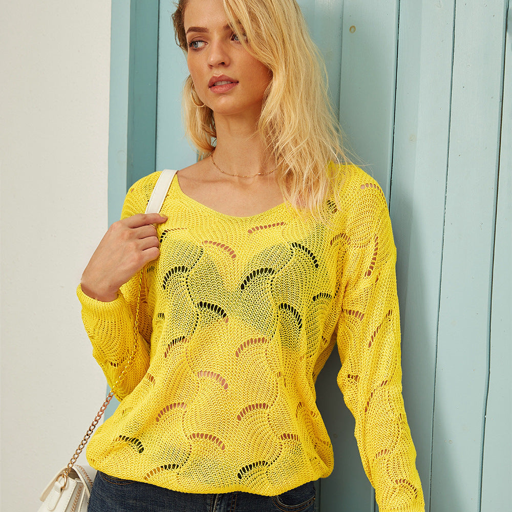 Loose knit sweater for women with V-neck and openwork pattern Lune London