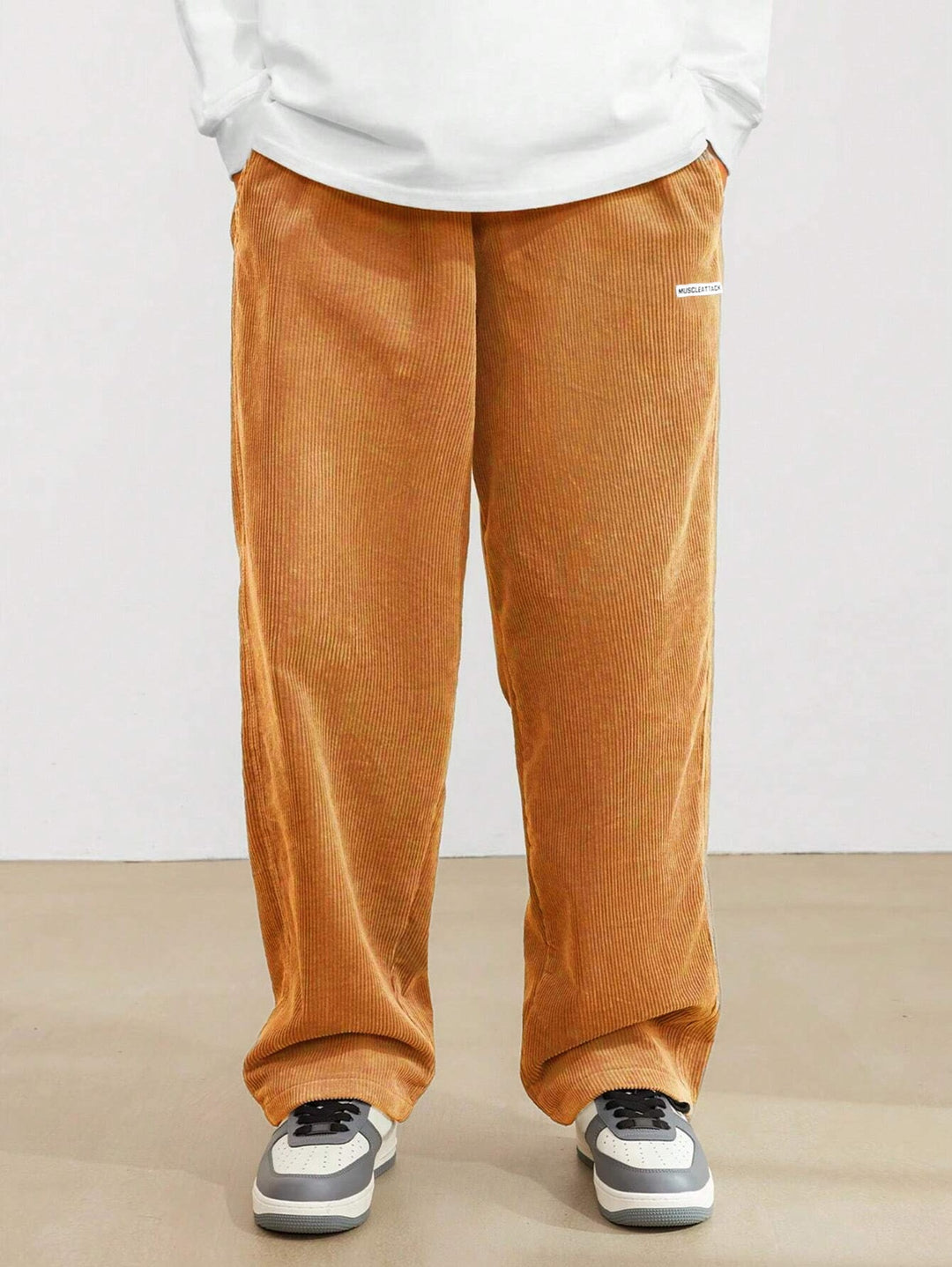 Wide corduroy pants for men with elastic waistband and practical side pockets Lune London