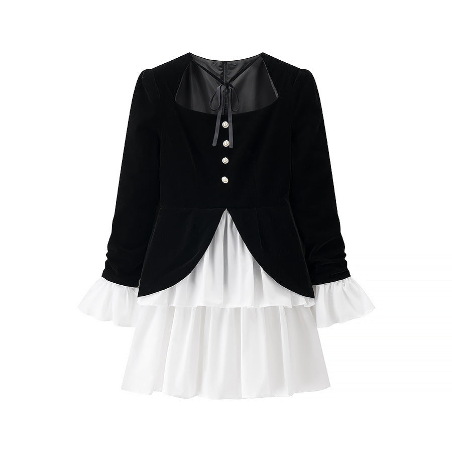 Party dress for ladies with an elegant design in black and white and a ruffle finish Lune London