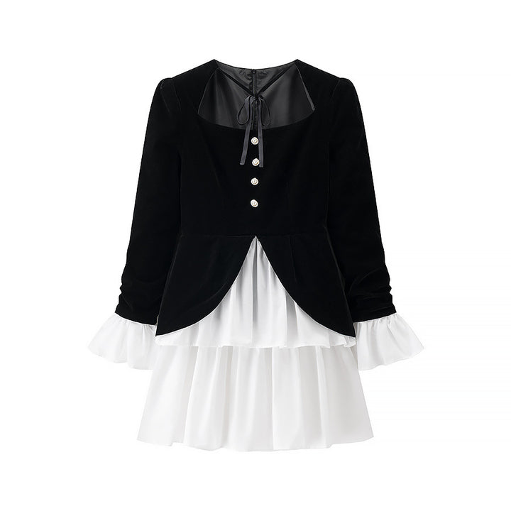 Party dress for ladies with an elegant design in black and white and a ruffle finish Lune London