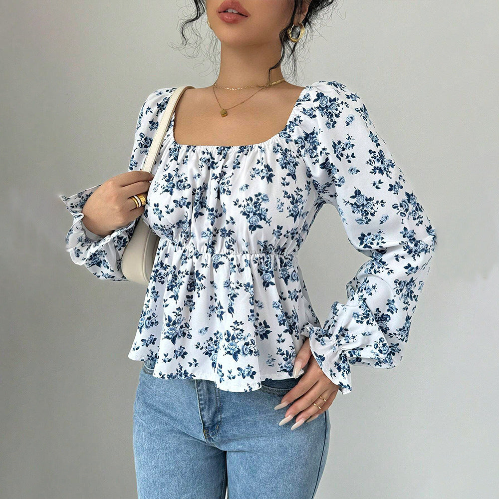 Women's blouse with floral design and voluminous sleeves Chic & Stil