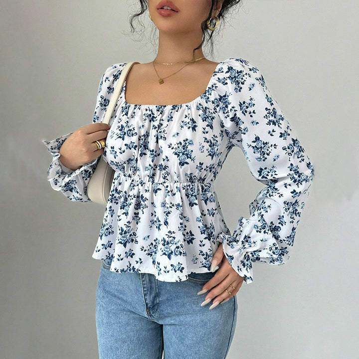 Women's blouse with floral design and voluminous sleeves Chic & Stil