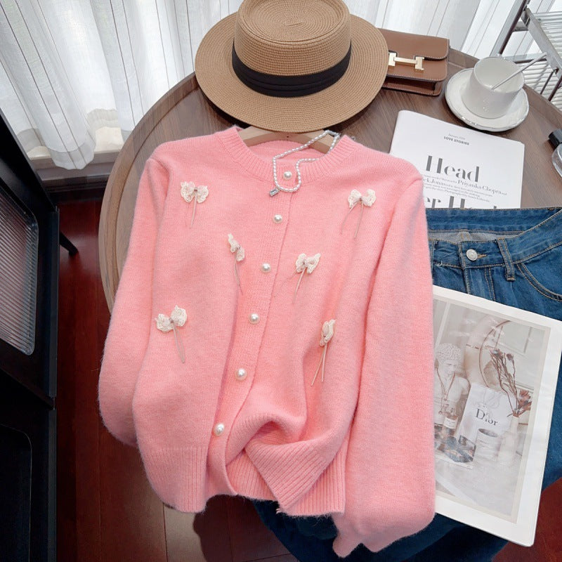 Knit jacket for women with feminine appliques and chic button details