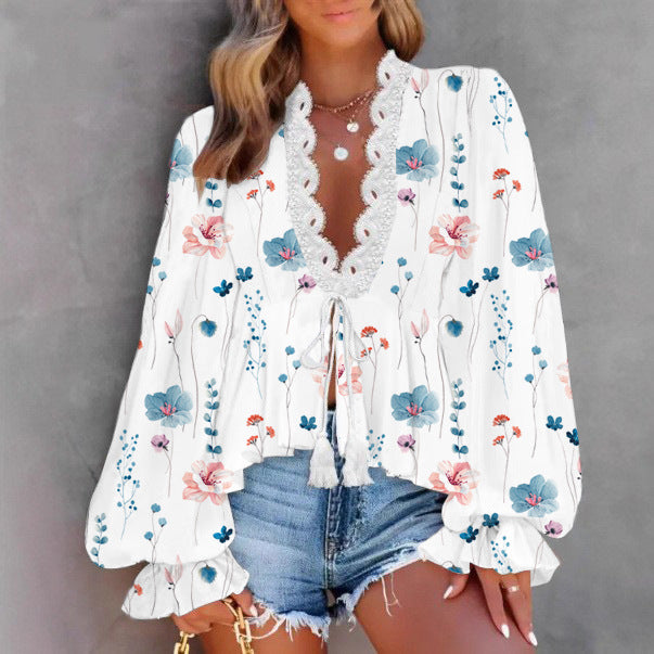 Lune London women's blouse with a playful floral print and lace edges