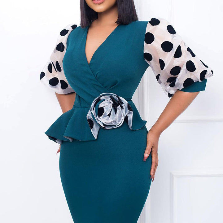 Fitted cocktail dress for women with sheer puff sleeves and floral accent Lune London