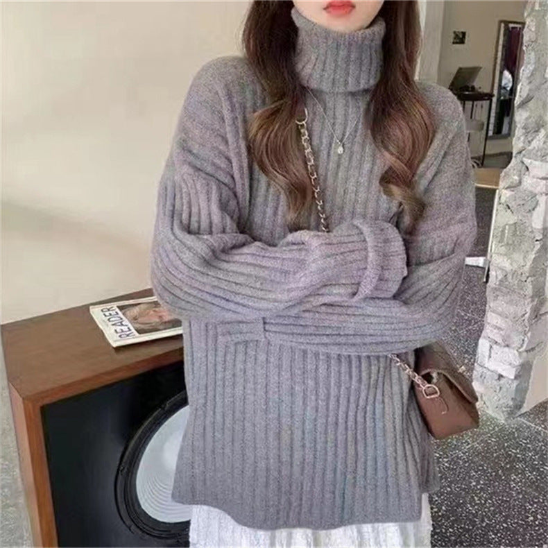 Woman Knit top with turtleneck and asymmetrical cut and fine ribbed structure Lune London