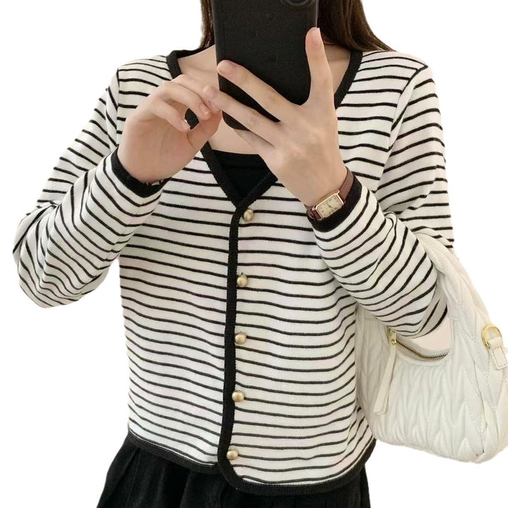 Ladies striped cardigan with elegant buttons and modern V-neck