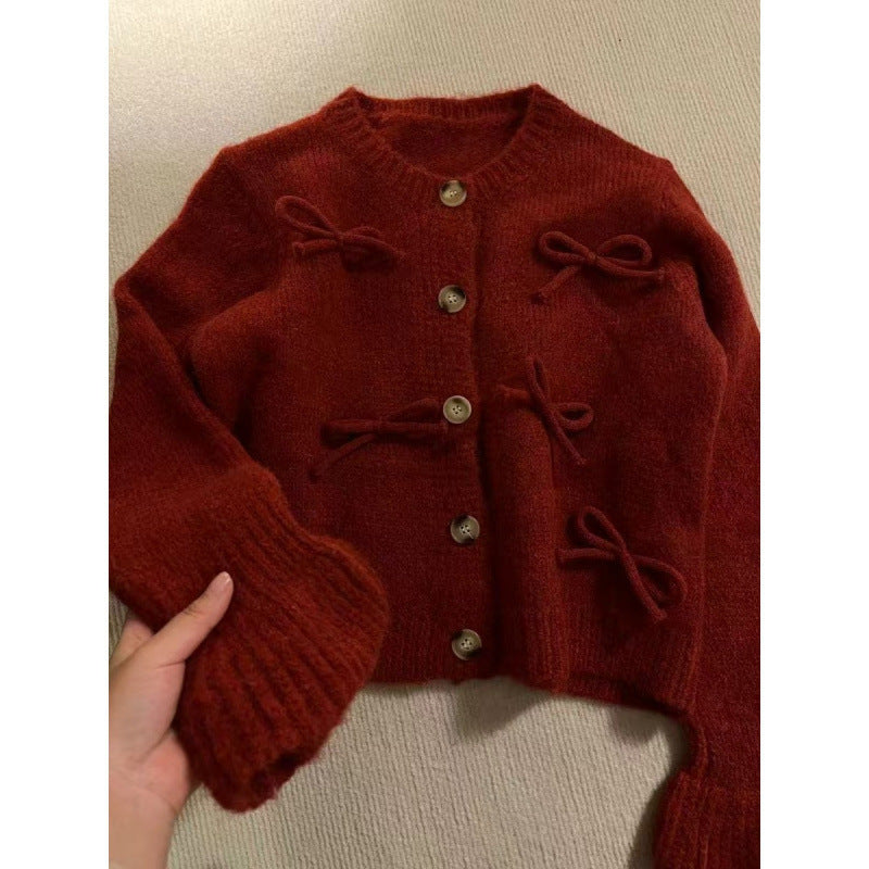 Cardigan pour femmes avec des nœuds décoratifs dessus