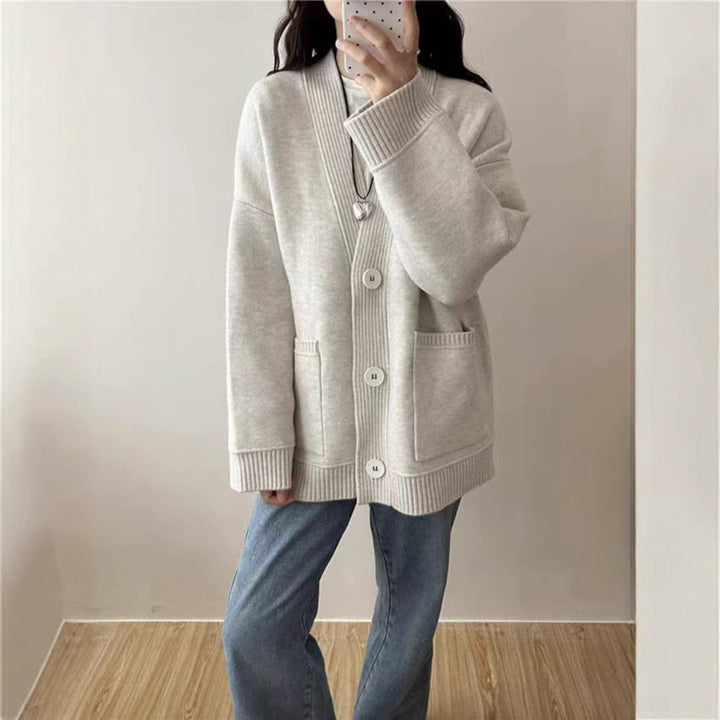 Cardigan en tricot décontracté pour femmes avec poches profondes et détails de boutons modernes Chic & Stil