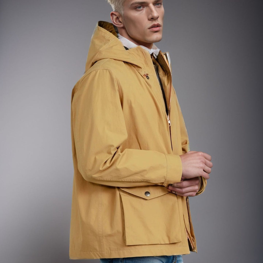 Transitional jacket for men with practical pockets and adjustable hood collar Lune London