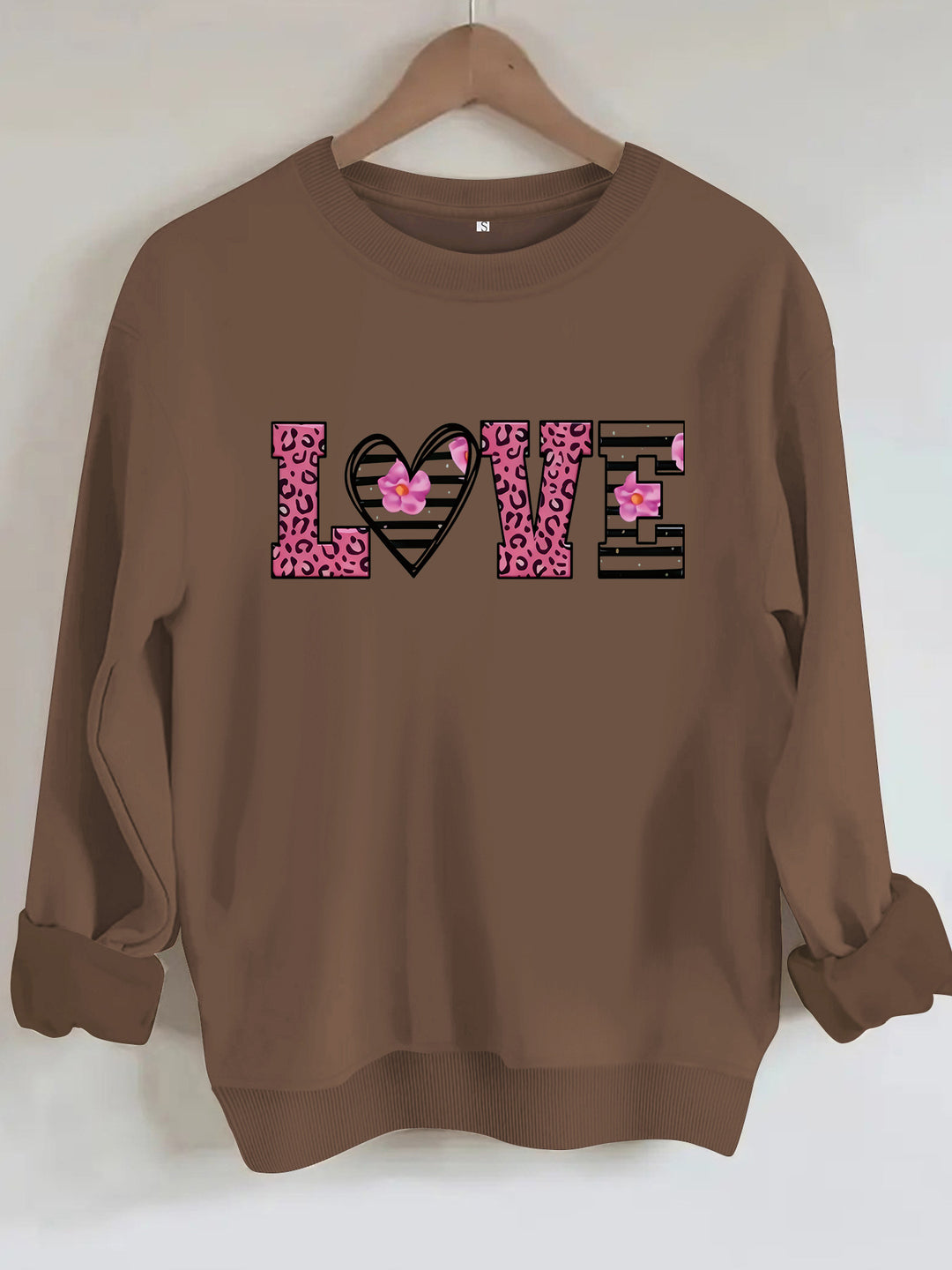 Sweatshirt femme avec design moderne de cœur léopard et coupe confortable Chic & Stil