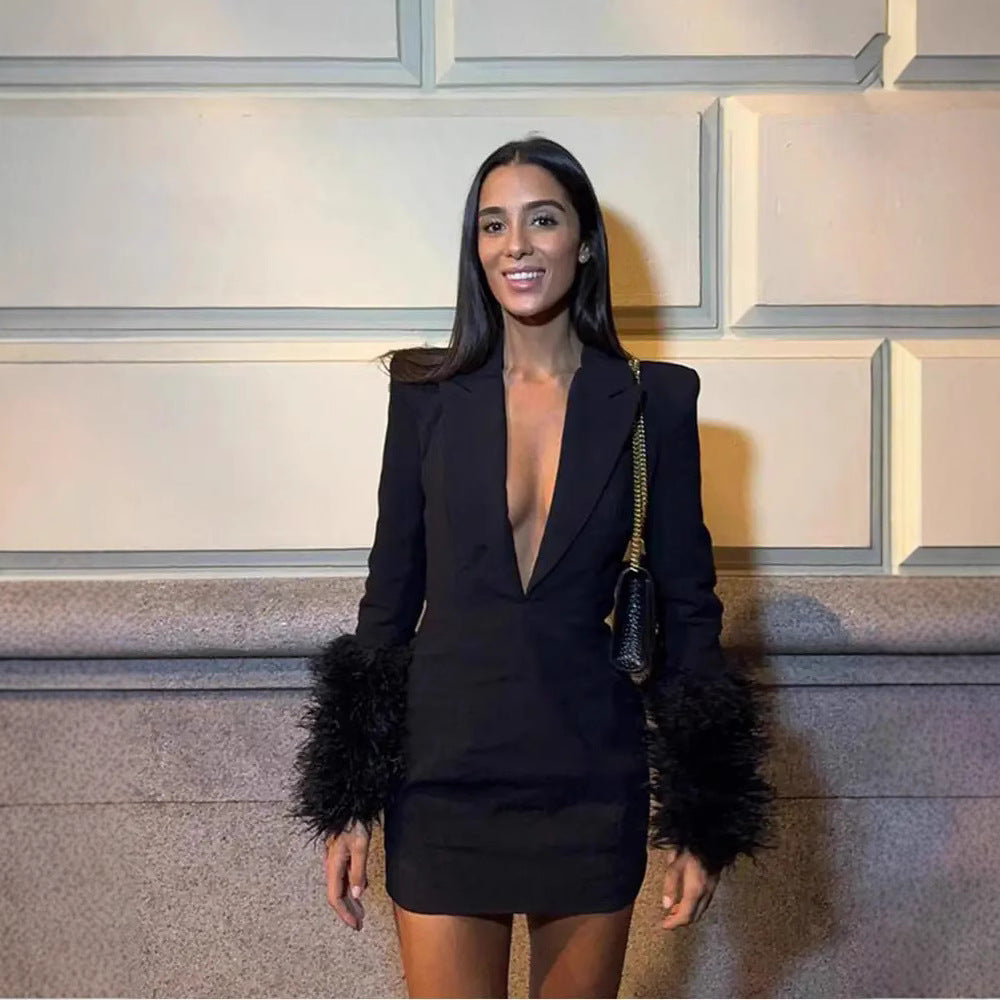 Sexy mini dress for women with deep V-neck and glamorous feather sleeves Lune London