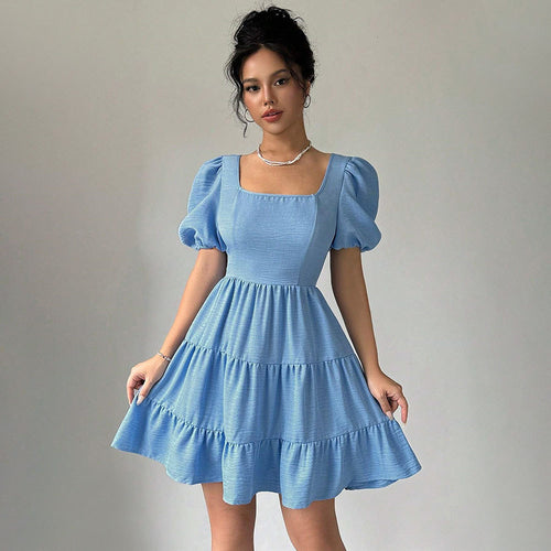 Robe pour femmes avec manches bouffantes et ourlet à volants Chic & Stil